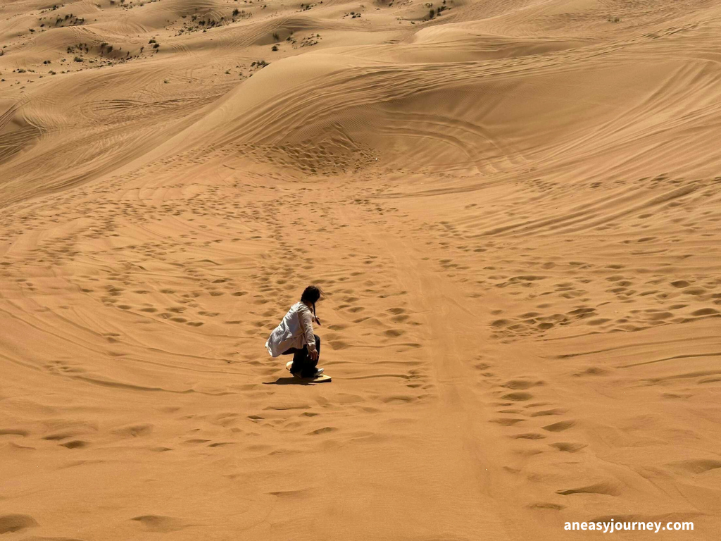 Dubai with food allergies. Sandboarding!