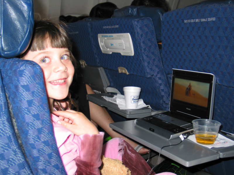 Photo of toddler traveling on a plane
